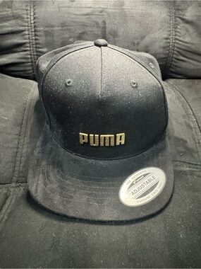 Puma Black Hat with Gold Accent Logo